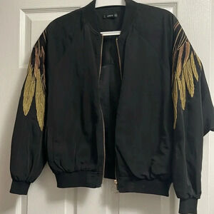 SHEIN XS oversized bomber jacket with embroidered feathers.